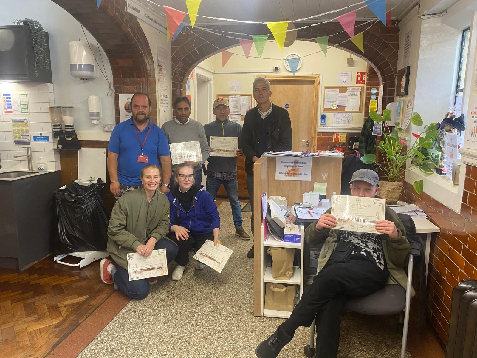 Volunteers working at Ace of Clubs